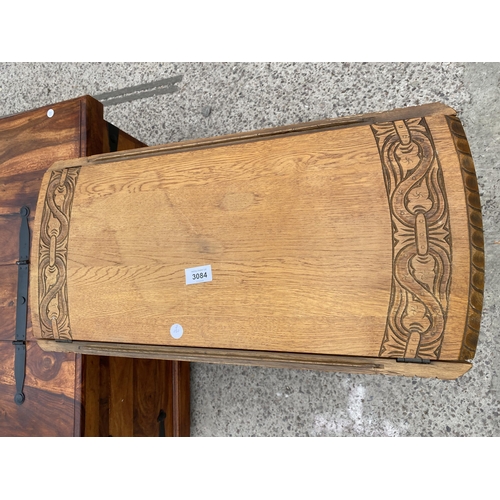 3084 - A SMALL OVAL OAK GATELEG TABLE ON TURNED LEGS, WITH CARVED TOP, 31.5 X 25