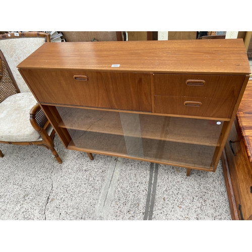 3086 - A RETRO TEAK BOOKCASE WITH TWO SLIDING GLASS DOORS, TWO DRAWERS AND BUREAU SECTION, 44.5