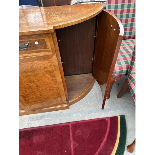 2582 - A REPRODUCTION WALNUT AND CROSSBANDED BREAKFRONT SIDEBOARD WITH FOUR CUPBOARDS AND THREE DRAWERS, 66... 