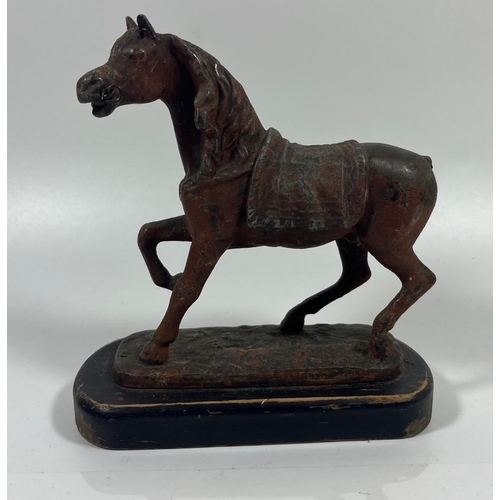 54 - A VINTAGE CAST IRON OR SPELTER MODEL OF A HORSE ON A WOODEN BASE, HEIGHT 16CM