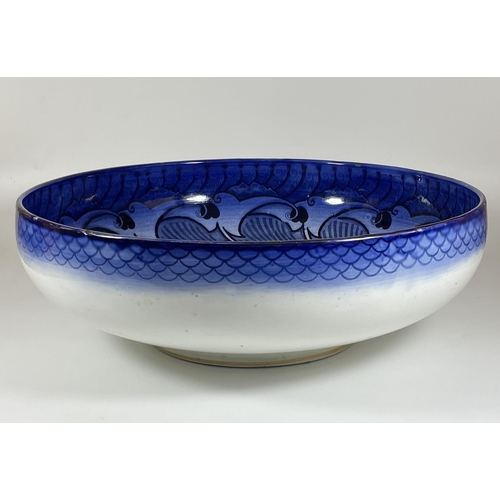 703 - A LARGE ART NOUVEAU ROYAL DOULTON BLUE AND WHITE GEOMETRIC FRUIT BOWL WITH ARTISTS MONOGRAM TO BASE