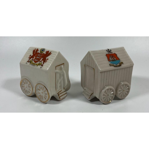 712 - A PAIR OF VINTAGE CRESTED WARE CHINA BATHING HUTS, FLORENTINE & CORONA - MORECAMBE AND APPLESY COAT ... 