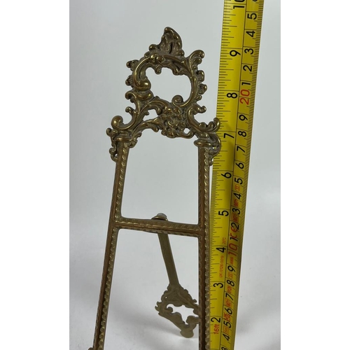 105 - A VINTAGE BRASS TABLE TOP EASEL DISPLAY, HEIGHT 24 CM