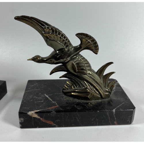 54 - A PAIR OF ART DECO BRASS BIRD DESIGN BOOKENDS ON MARBLE BASES, HEIGHT 12 CM