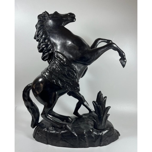 56 - A VINTAGE PAINTED BLACK SPELTER MARLEY HORSE AND RIDER FIGURE, HEIGHT 39 CM