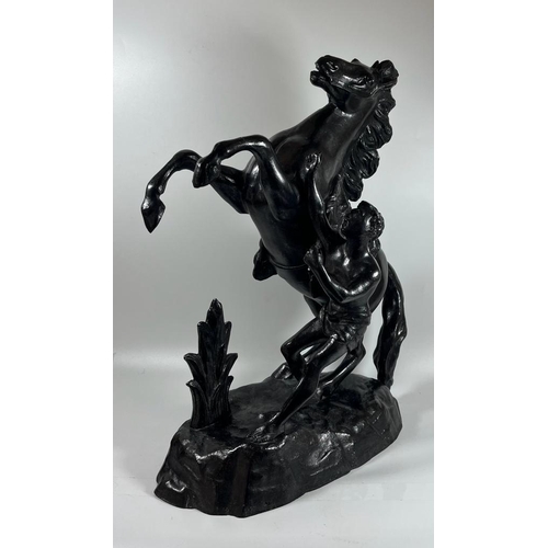 56 - A VINTAGE PAINTED BLACK SPELTER MARLEY HORSE AND RIDER FIGURE, HEIGHT 39 CM