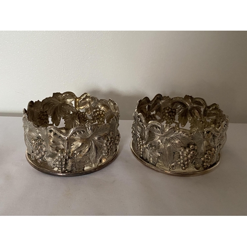 22 - A PAIR OF PORTUGUESE TOPAZIO CASQUINHA ORNATE SILVER PLATED WINE COASTERS, T CROWN MARK AND DATE LET... 