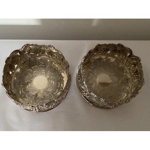 22 - A PAIR OF PORTUGUESE TOPAZIO CASQUINHA ORNATE SILVER PLATED WINE COASTERS, T CROWN MARK AND DATE LET... 