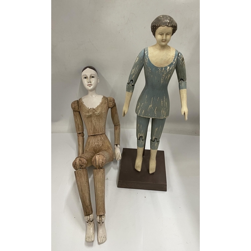 35 - TWO VINTAGE PAINTED WOODEN MOVEABLE DOLLS