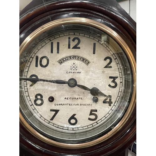98 - A WOODEN CASED TOKYO CLOCK CO REGULATOR WALL CLOCK WITH PENDULUM AND KEY