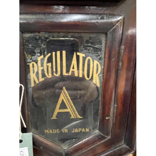 98 - A WOODEN CASED TOKYO CLOCK CO REGULATOR WALL CLOCK WITH PENDULUM AND KEY