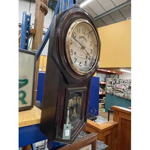 98 - A WOODEN CASED TOKYO CLOCK CO REGULATOR WALL CLOCK WITH PENDULUM AND KEY