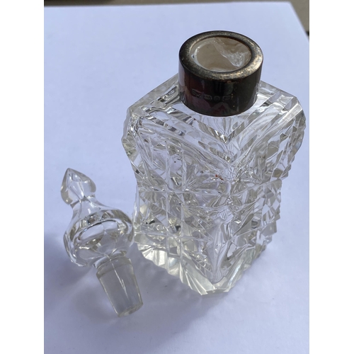 69 - A VICTORIAN 1893 SILVER COLLAR AND CUT GLASS PERFUME BOTTLE, HEIGHT 15 CM