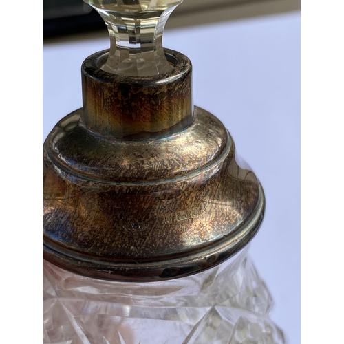 70 - A SILVER AND CUT GLASS PERFUME BOTTLE, HEIGHT 18 CM