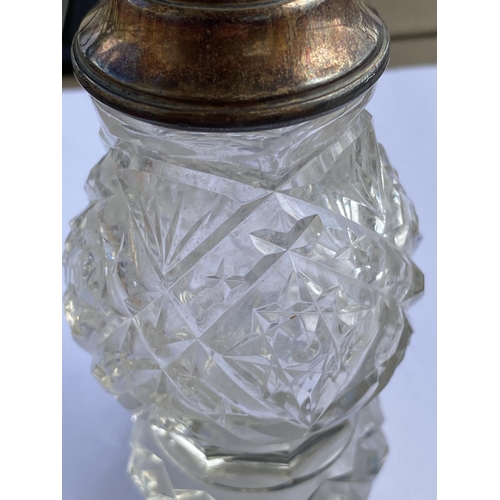 70 - A SILVER AND CUT GLASS PERFUME BOTTLE, HEIGHT 18 CM