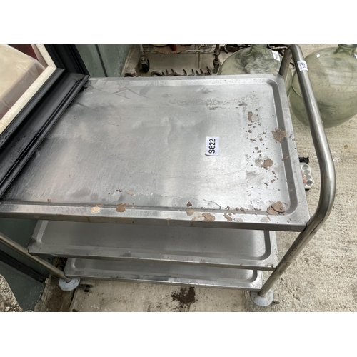 1637 - A THREE TIER STAINLESS STEEL FOUR WHEELED TROLLEY