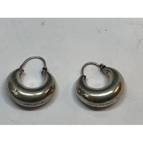 687 - A PAIR OF SILVER HOOP EARRINGS