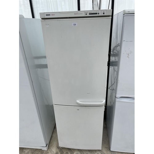 A TALL WHITE BOSCH EXXCEL FRIDGE FREEZER