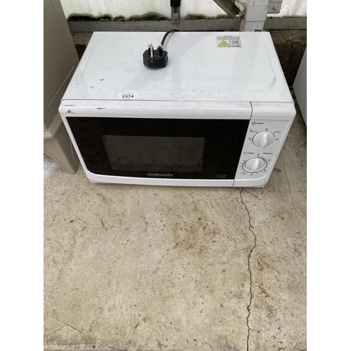 2374 - A WHITE COOKWORKS MICROWAVE OVEN