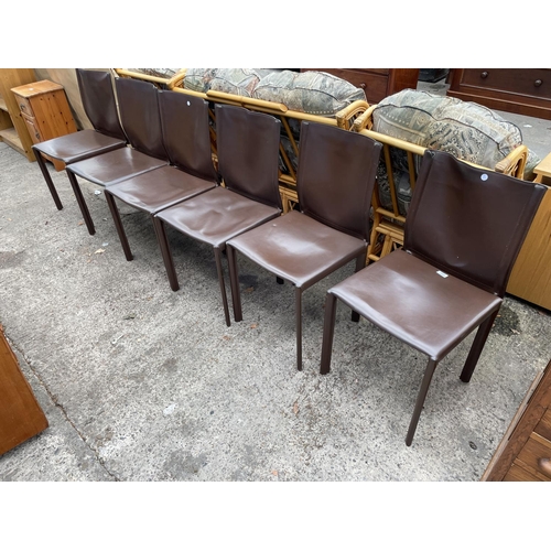 3060 - A SET OF SIX BROWN FAUX LEATHER DINING CHAIRS