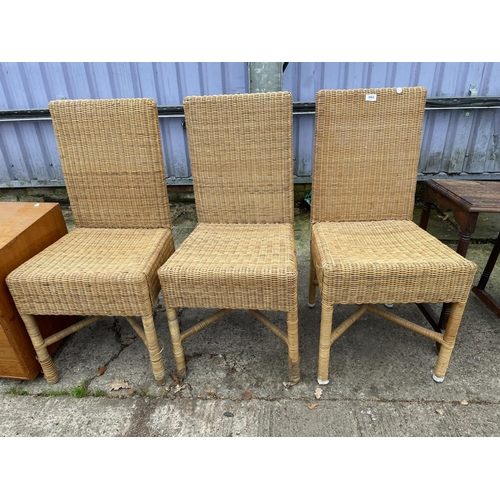 3063 - THREE WICKER HIGH BACK DINING CHAIRS