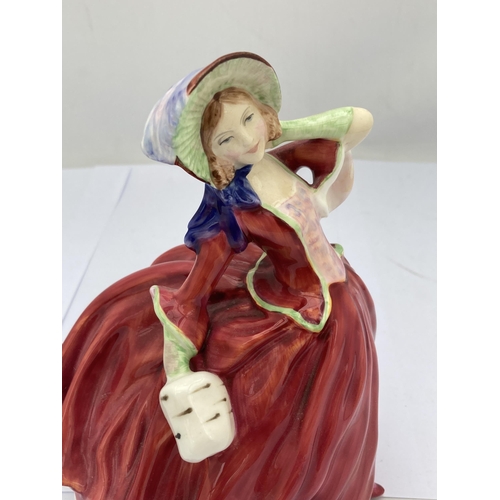 388 - A ROYAL DOULTON 'AUTUMN BREEZES' HN1934 LADY FIGURE