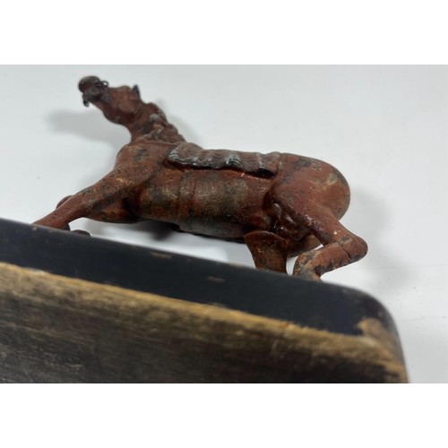 78 - A VINTAGE CAST IRON OR SPELTER MODEL OF A HORSE ON A WOODEN BASE, HEIGHT 16CM