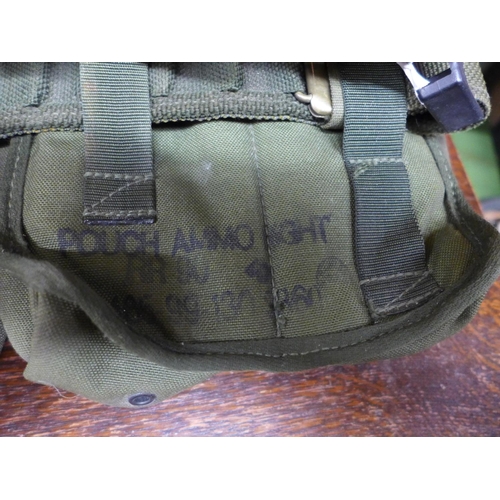 397 - A BRITISH ARMY WEBBING BELT AND POUCHES