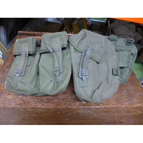 397 - A BRITISH ARMY WEBBING BELT AND POUCHES