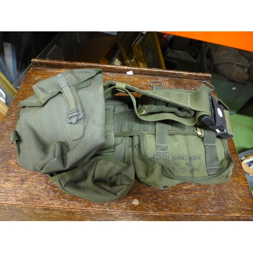 397 - A BRITISH ARMY WEBBING BELT AND POUCHES