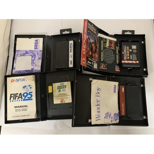 324 - FOUR SEGA MEGA DRIVE GAMES FIFA 95 SOCCER, THE JUNGLE BOOK, WRESTLEMANIA AND WONDER BOY THE MEGA CAR... 