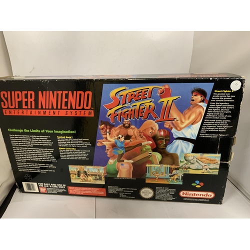 342 - A SUPER NINTENDO ENTERTAINMENT SYSTEM INCLUDING THE WORLD'S GREATEST ARCADE HIT STREET FIGHTER II PA... 