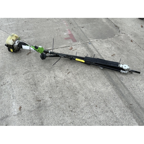 6 - A 'HANDY' PETROL MULTI TOOL WITH HEDGE CUTTER, STRIMMER AND CHAINSAW ATTATCHMENT NO VAT