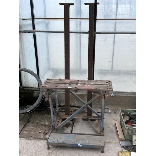 73 - A FOLDING WORKMATE BENCH AND A PAIR OF STEEL ARMS NO VAT