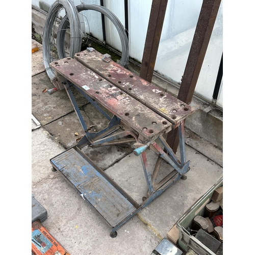 73 - A FOLDING WORKMATE BENCH AND A PAIR OF STEEL ARMS NO VAT