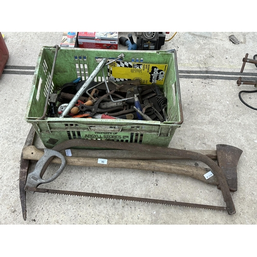 80 - AN ASSORTMENT OF TOOLS TO INCLUDE A PICK AXE AND AN AXE ETC NO VAT