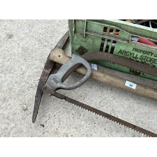 80 - AN ASSORTMENT OF TOOLS TO INCLUDE A PICK AXE AND AN AXE ETC NO VAT