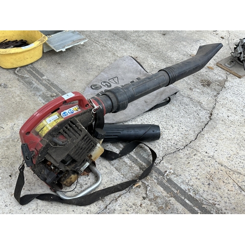 9 - A HOMELITE HB-180V PETROL LEAF BLOWER NO VAT