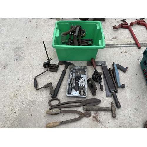 94 - AN ASSORTMENT OF TOOLS TO INCLUDE PLIERS, RASPS AND AN AXE ETC NO VAT