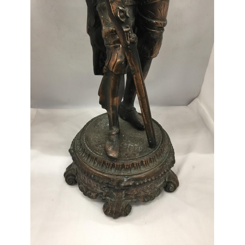 13 - A LARGE BRONZE EFFECT SPELTER FIGURE OF A 16TH CENTURY ITALIAN MUSKETEER ON PEDESTAL, 30