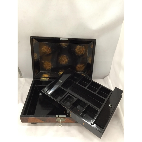 14 - AN ORIENTAL STYLE BLACK LACQUERED AND WOODEN JEWELLERY BOX WITH KEY