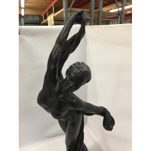 32 - A LARGE RESIN MODEL OF A FEMALE DANCER