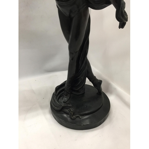 32 - A LARGE RESIN MODEL OF A FEMALE DANCER