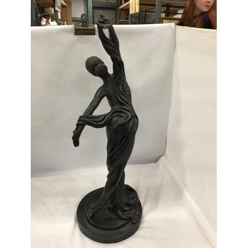 32 - A LARGE RESIN MODEL OF A FEMALE DANCER