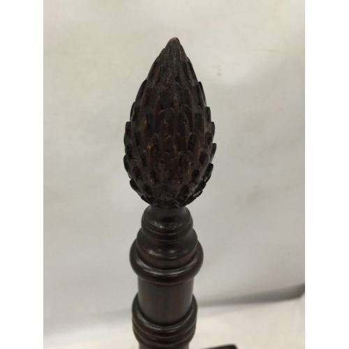 36 - A VINTAGE MAHOGANY FOUR SECTION BOTTLE HOLDER WITH CARVED TOP