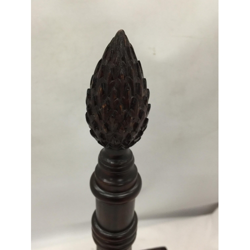 36 - A VINTAGE MAHOGANY FOUR SECTION BOTTLE HOLDER WITH CARVED TOP