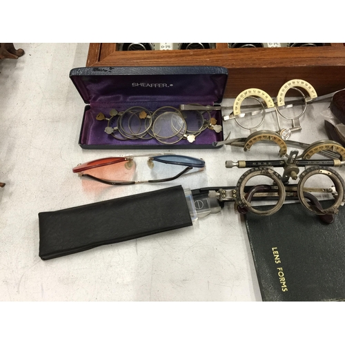 40 - A RAYNER OPTICAL TESTING SET COMPLETE WITH LENS', TESTING GLASSES, CASED SPECTACLES ETC