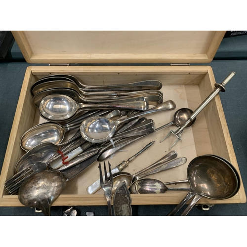 183 - A WOODEN BOX CONTAINING ASSORTED SILVER PLATED CUTLERY