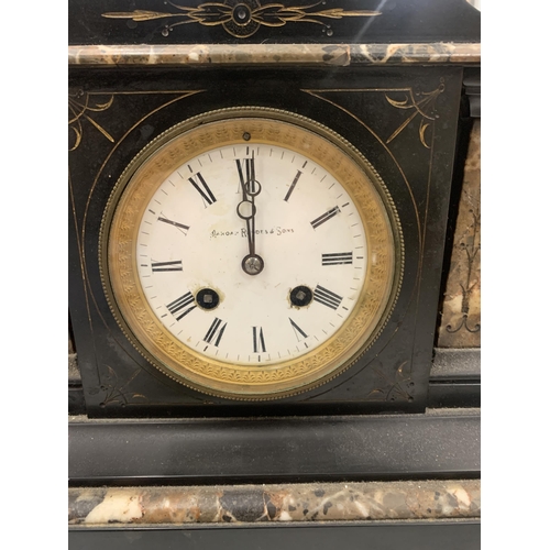 198 - AN ANTIQUE RHODES & SONS BLACK MARBLE SLATE MANTLE CLOCK