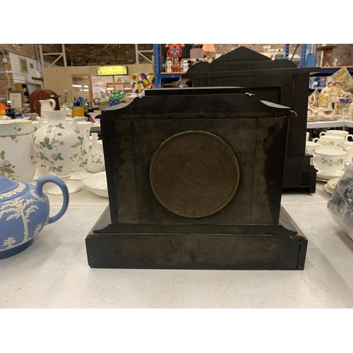 198 - AN ANTIQUE RHODES & SONS BLACK MARBLE SLATE MANTLE CLOCK